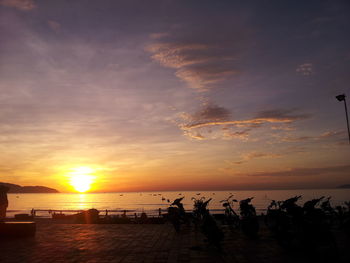 Scenic view of sea at sunset