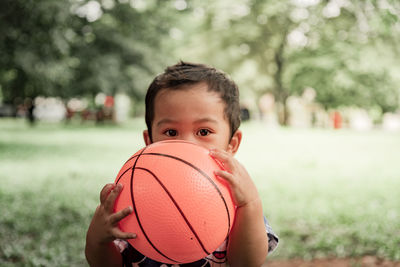 Boy playing basketball