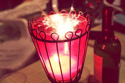 Close-up of lit tea light candle