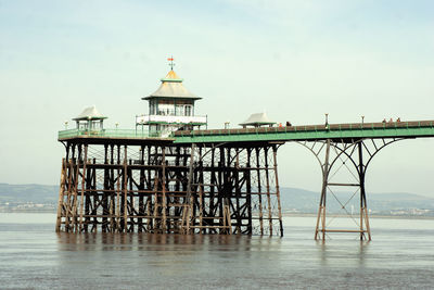 Pier over sea against sky