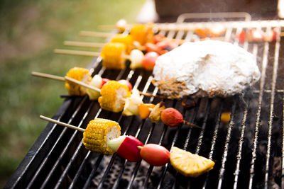 Close-up of meat on barbecue grill