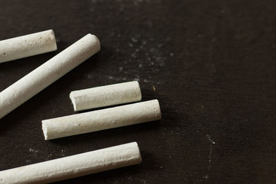 High angle view of cigarette on table