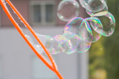 Close-up of bubbles in rainbow