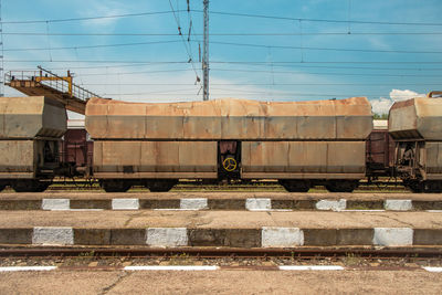 Train on railroad track against sky