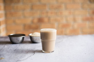 Close-up of coffee cup on table