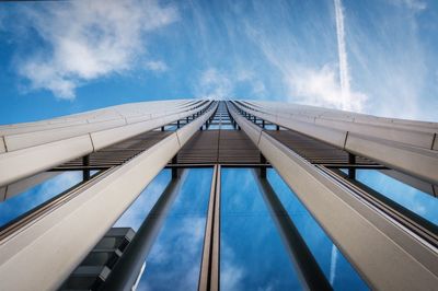 Low angle view of bridge against blue sky