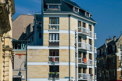 Low angle view of residential building against sky