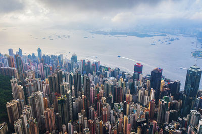 Panoramic view of modern buildings in city against sky