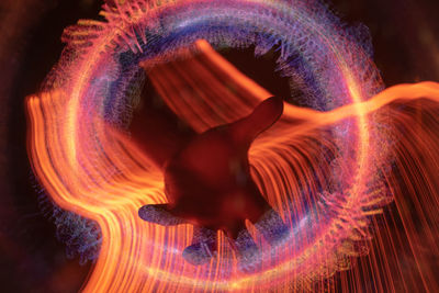 Digital composite image of light painting at night