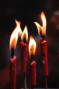 Close-up of burning candles