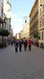 People walking on city street