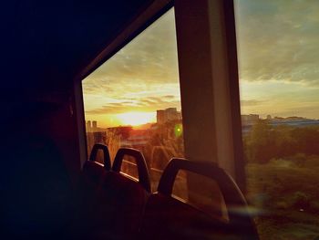 View of sunset through car window