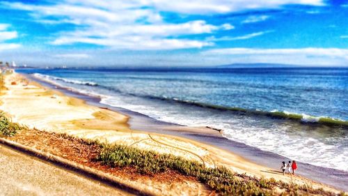 Scenic view of beach against sky