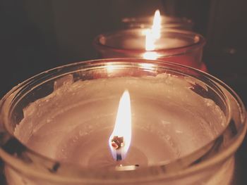 Close-up of lit tea light candle