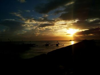 Scenic view of sea at sunset