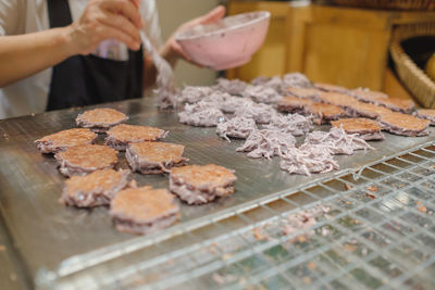 Man preparing food in kitchen