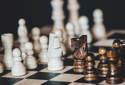 Close-up of chess pieces on board