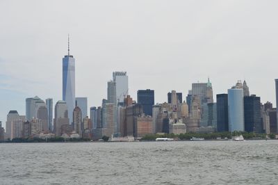 Modern buildings in city against sky