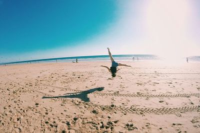 Scenic view of beach against clear sky