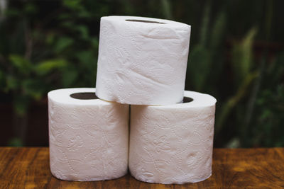 Close-up of white stack on table