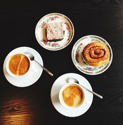 Directly above shot of cappuccino served on table