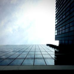 Low angle view of modern building against sky