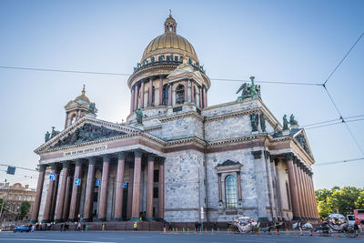 Facade of historic building against sky