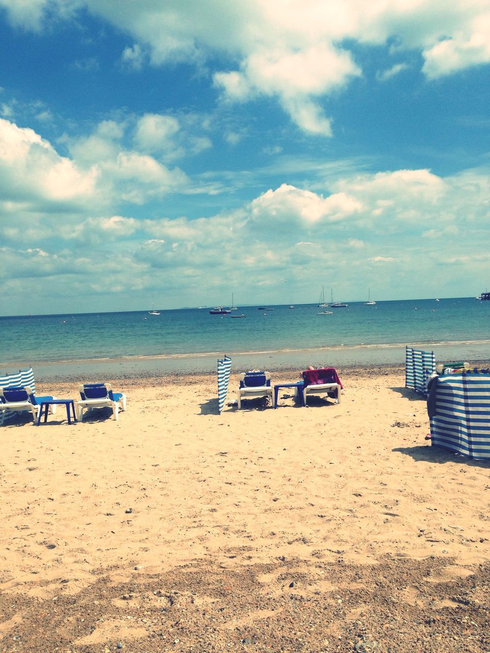 beach, sand, sea, horizon over water, shore, sky, water, tranquility, tranquil scene, scenics, cloud - sky, beauty in nature, nature, vacations, absence, cloud, beach umbrella, transportation, idyllic, deck chair