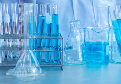 Blue chemical in container at laboratory