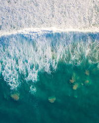 Close-up of water splashing in sea