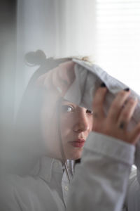 Close-up portrait of young woman