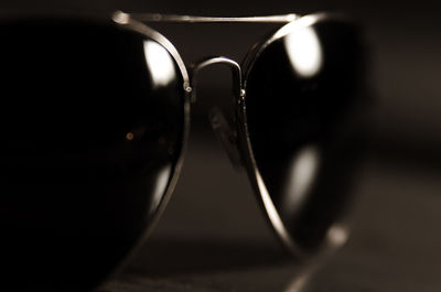 Close-up of sunglasses on table
