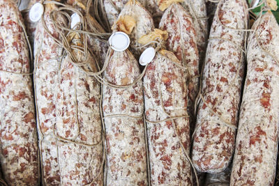 High angle view of salami at market for sale