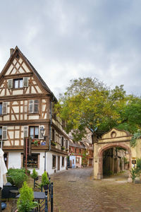 Street with historical half-timbered houses in kaysersberg, alsace, france