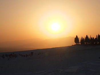 Scenic view of beach during sunset