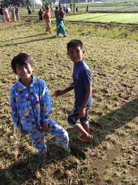 Boy playing on ground