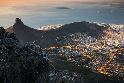 High angle shot of town against calm sea