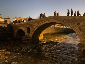 Arch bridge over river