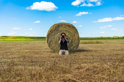 Full length of man on field