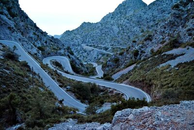 Scenic view of mountain road against sky