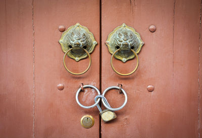 Directly above shot of closed door knocker