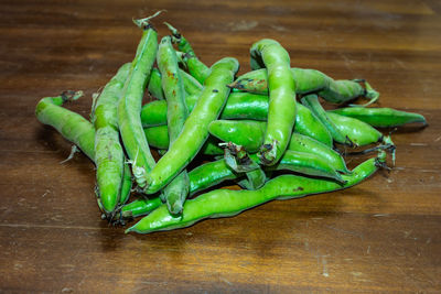 High angle view of green chili pepper on table