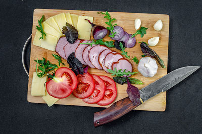 High angle view of sushi on cutting board
