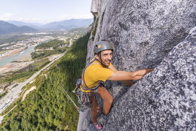 Man climbing on rock