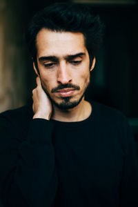 Close-up of sad young man