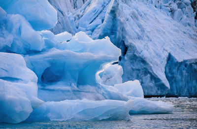 Iceberg floating at a glacier in arctic