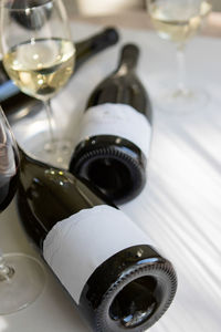 Close-up of wine bottles on table