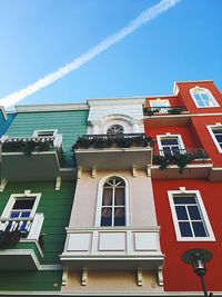 Low angle view of building against blue sky