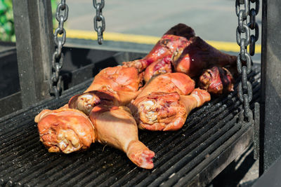 Grilled turkey legs prepared outdoors