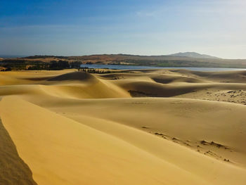 Scenic view of desert against sky